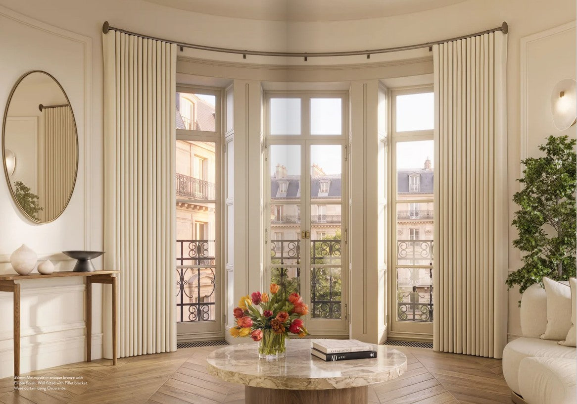 Where can I find curtain poles designed for bay windows?